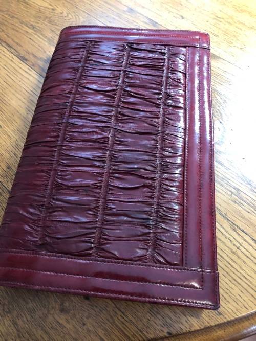 Genuine eelskin rusched clutch handbag